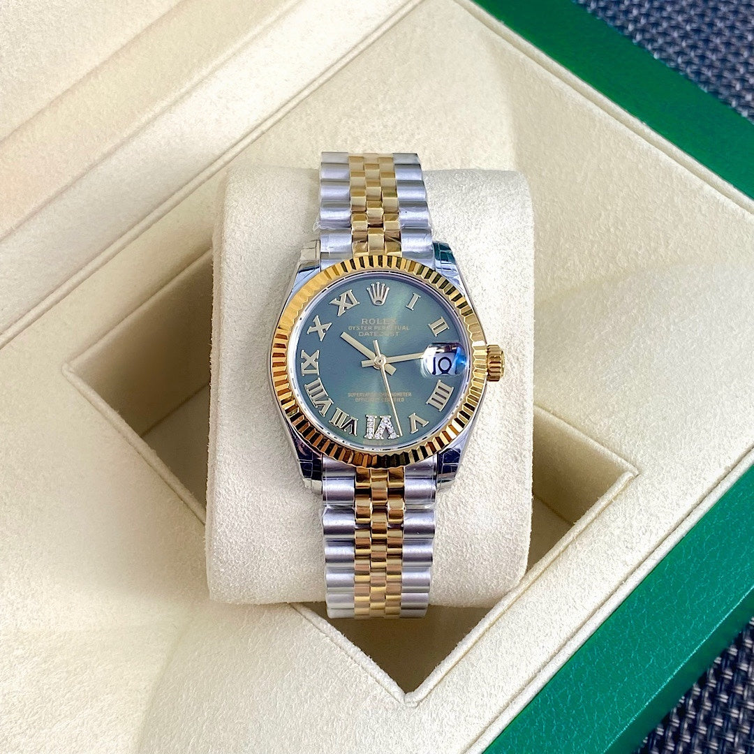 Rolex watch front view with green dial and two-tone gold-and-silver bracelet