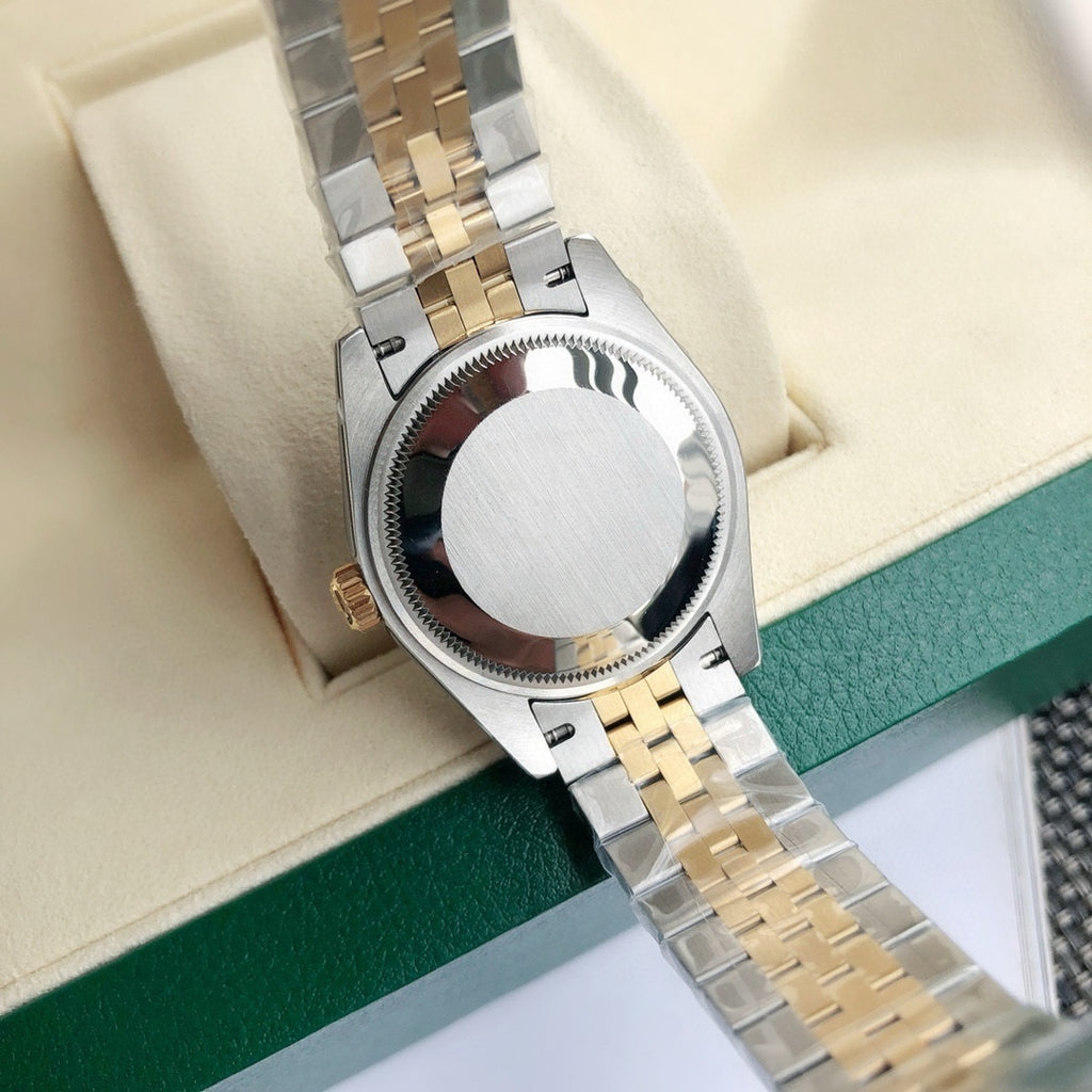 Rolex watch caseback view with two-tone gold-and-silver bracelet and crown