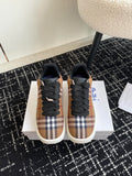 Burberry low-top sneakers, plaid uppers with black laces and white rubber sole