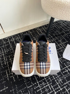 Burberry low-top sneakers, plaid uppers with black laces and white rubber sole