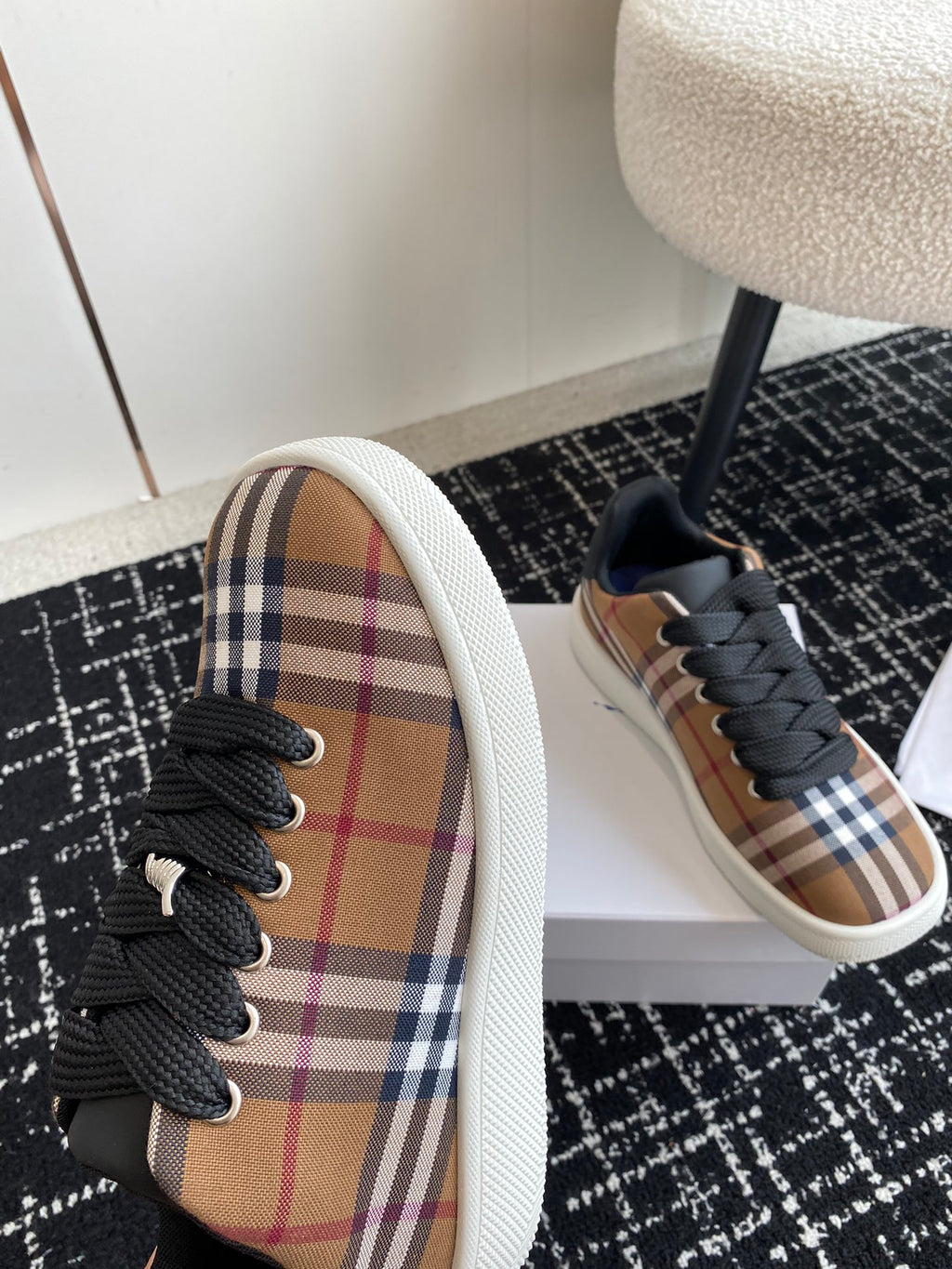 Burberry low-top sneakers, plaid side with black laces and blue-toned lining