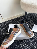 Burberry low-top sneakers, plaid upper with black laces and white rubber sole