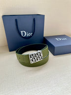 Dior belt on stand: olive green leather with gold square Dior monogram buckle