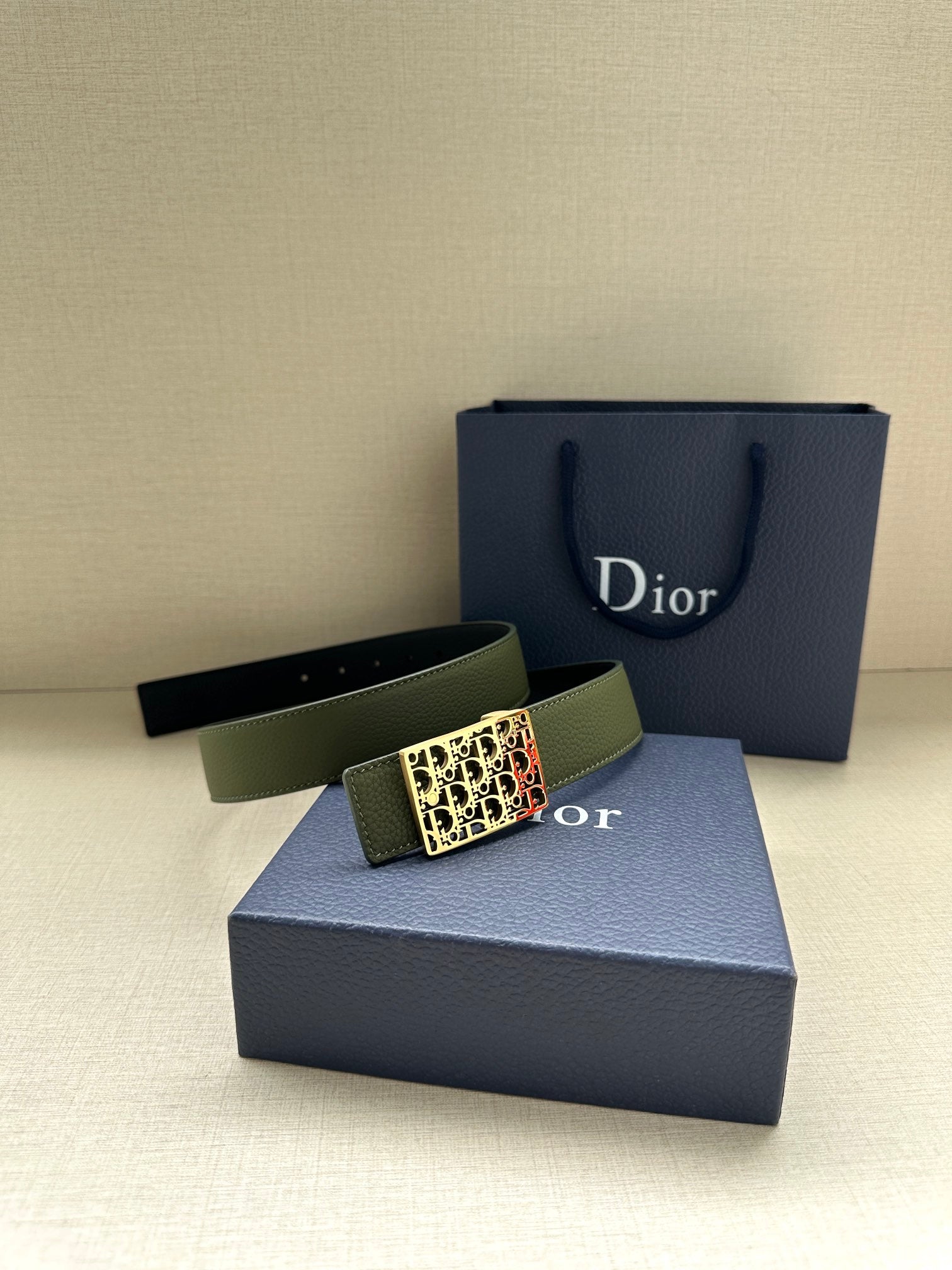 Dior belt in olive green leather with gold-tone Dior monogram buckle