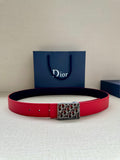Dior belt in red with rectangular logo buckle, adjustable holes.
