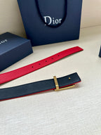 Dior belt with red and navy straps, gold-tone buckle and adjustable holes.