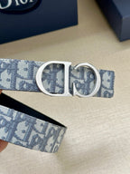 Dior belt detail with silver CD buckle on light-blue logo strap