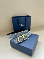 Dior belt with gold CD buckle on light-blue logo strap