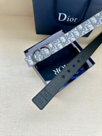 Monogram belt with reversible dark leather strap, blue-gray patterned strap shown open