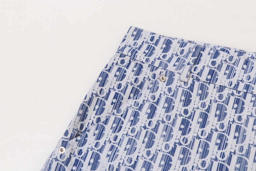 Blue and white patterned Dior shorts with buttoned waistband detail