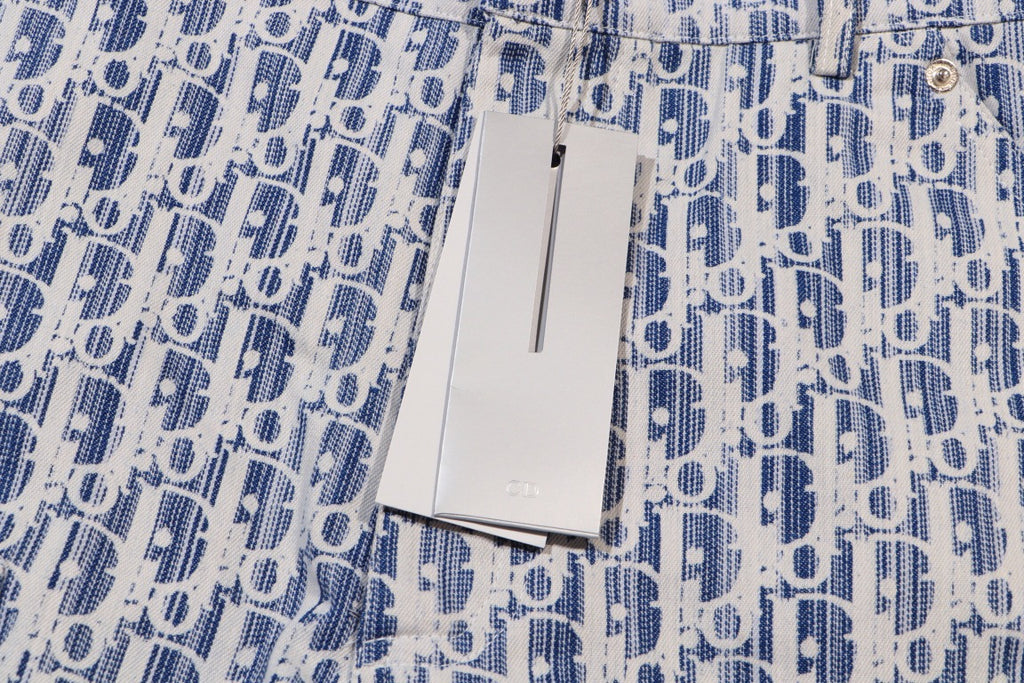 Dior shorts with hanging white size tag on blue print