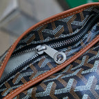 Monogram canvas bag zipper with metal pull and brown leather edging