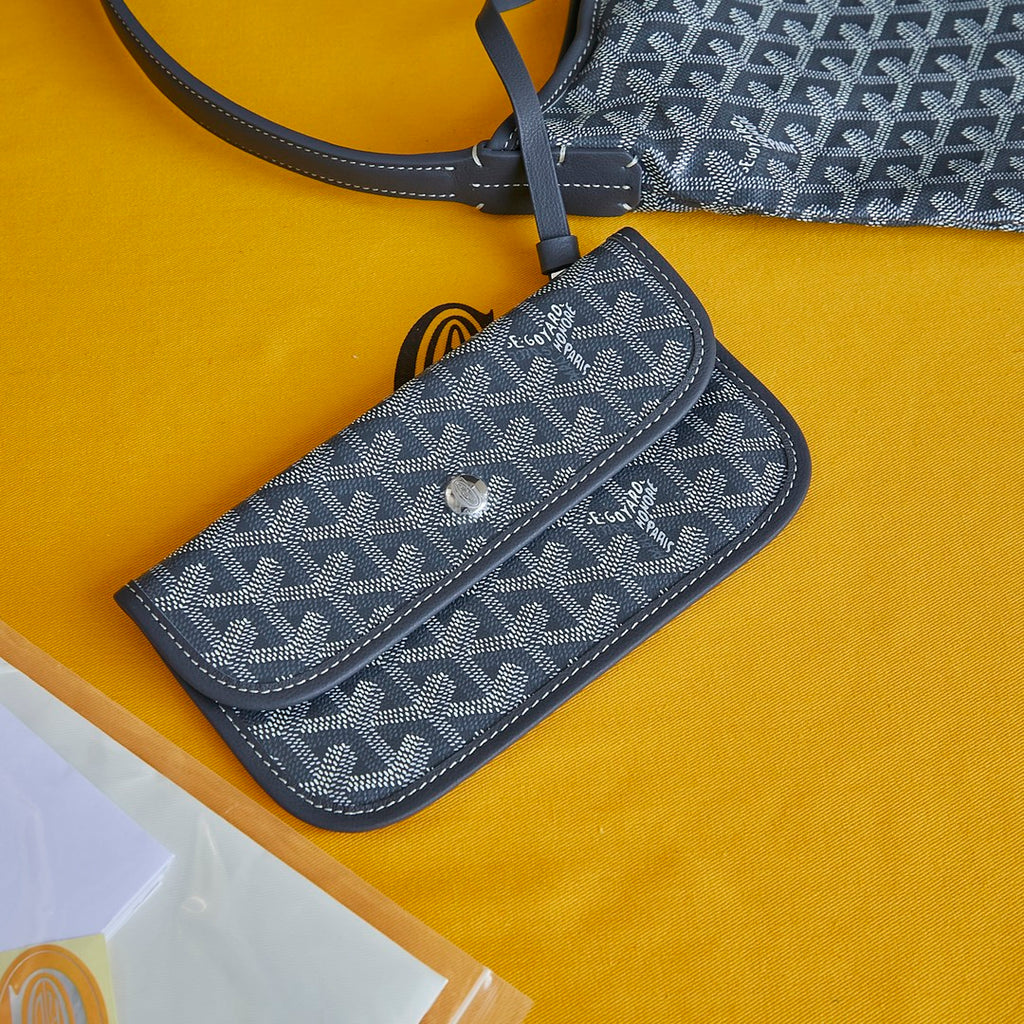 Goyard small wristlet, blue-gray Goyardine pattern, wrist strap