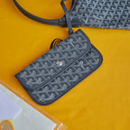 Goyard small wristlet, blue-gray Goyardine pattern, wrist strap
