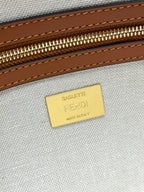 Beige canvas interior with gold FENDI label and MADE IN ITALY text