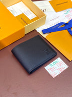 Small leather card wallet with embossed logo, compact folded shape