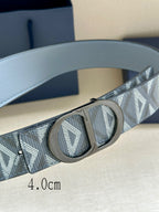 Dior belt close-up: patterned strap with oval metal buckle and adjustment holes
