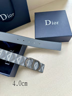 Dior belt with pale blue strap and repeating 'D' print, oval metal buckle