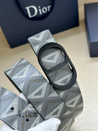 Dior belt close-up: light blue patterned strap with black buckle and eyelets