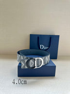 Logo-print belt with silver buckle, shown with dark-blue box and bag