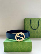 Gucci belt in dark blue leather with gold-tone circular GG buckle