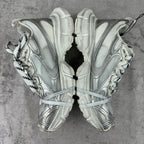 Balenciaga silver lace-up sneakers, front view with open laces