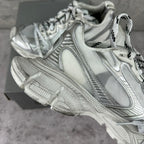 Balenciaga silver lace-up sneakers, angled side view