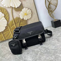 Prada bag set in black leather with flap, strap, and matching mini crossbody pouch.