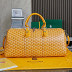 Goyard duffel bag, yellow patterned canvas, leather handles, shoulder strap