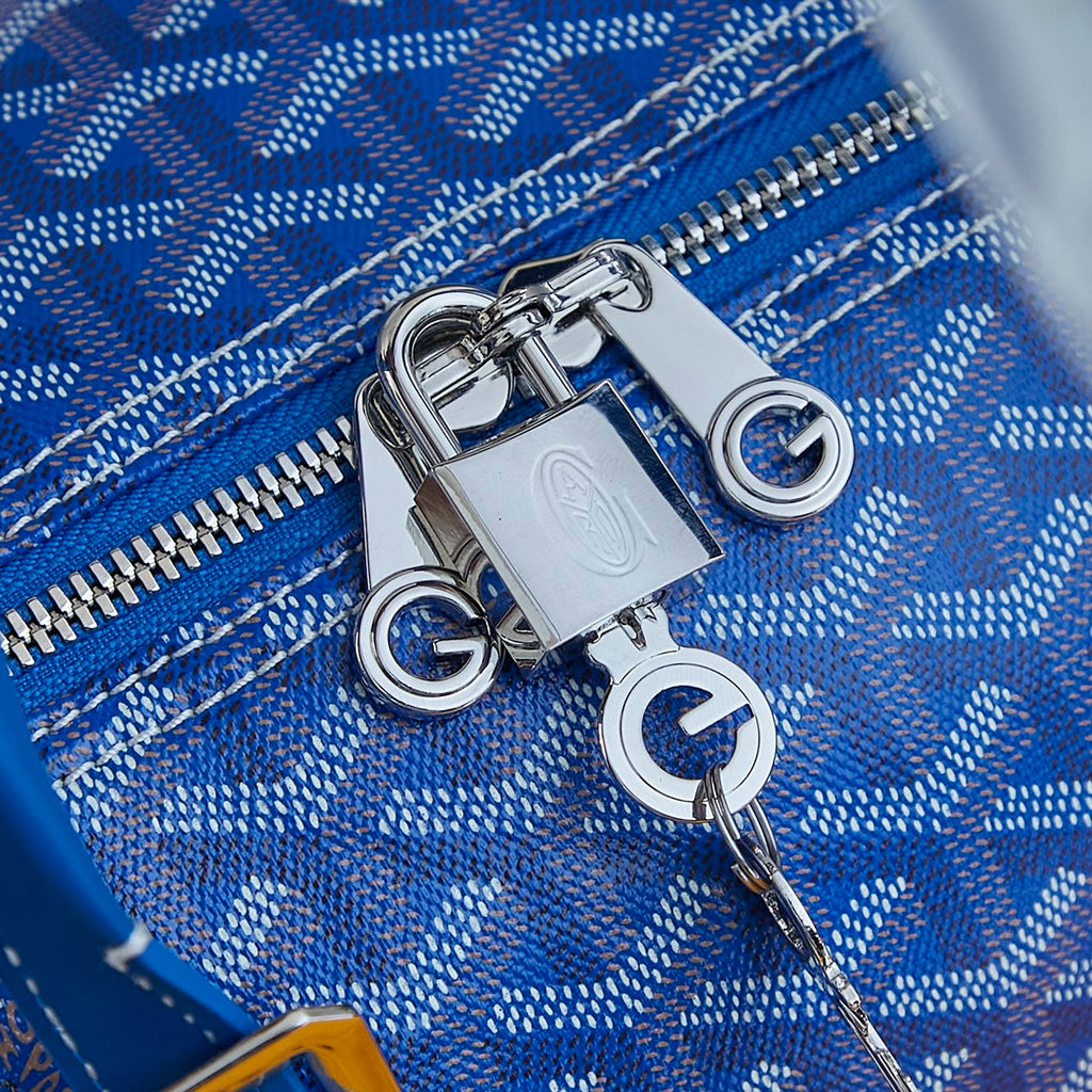 Goyard blue monogram duffle bag zipper pull with metal lock hardware