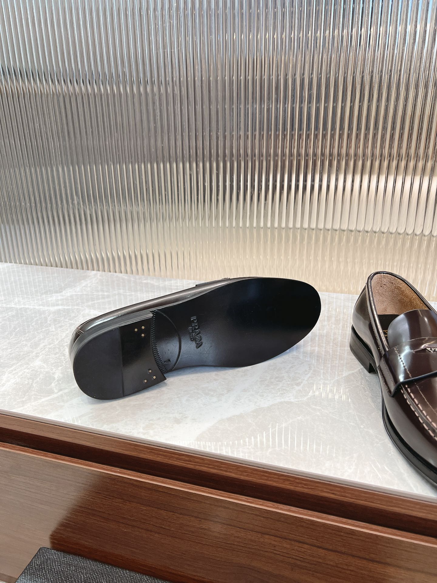 Prada unisex leather loafers, dark brown, interior view of the sole