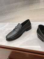 Prada unisex loafers, dark textured leather with strap, low heel and side metal logo