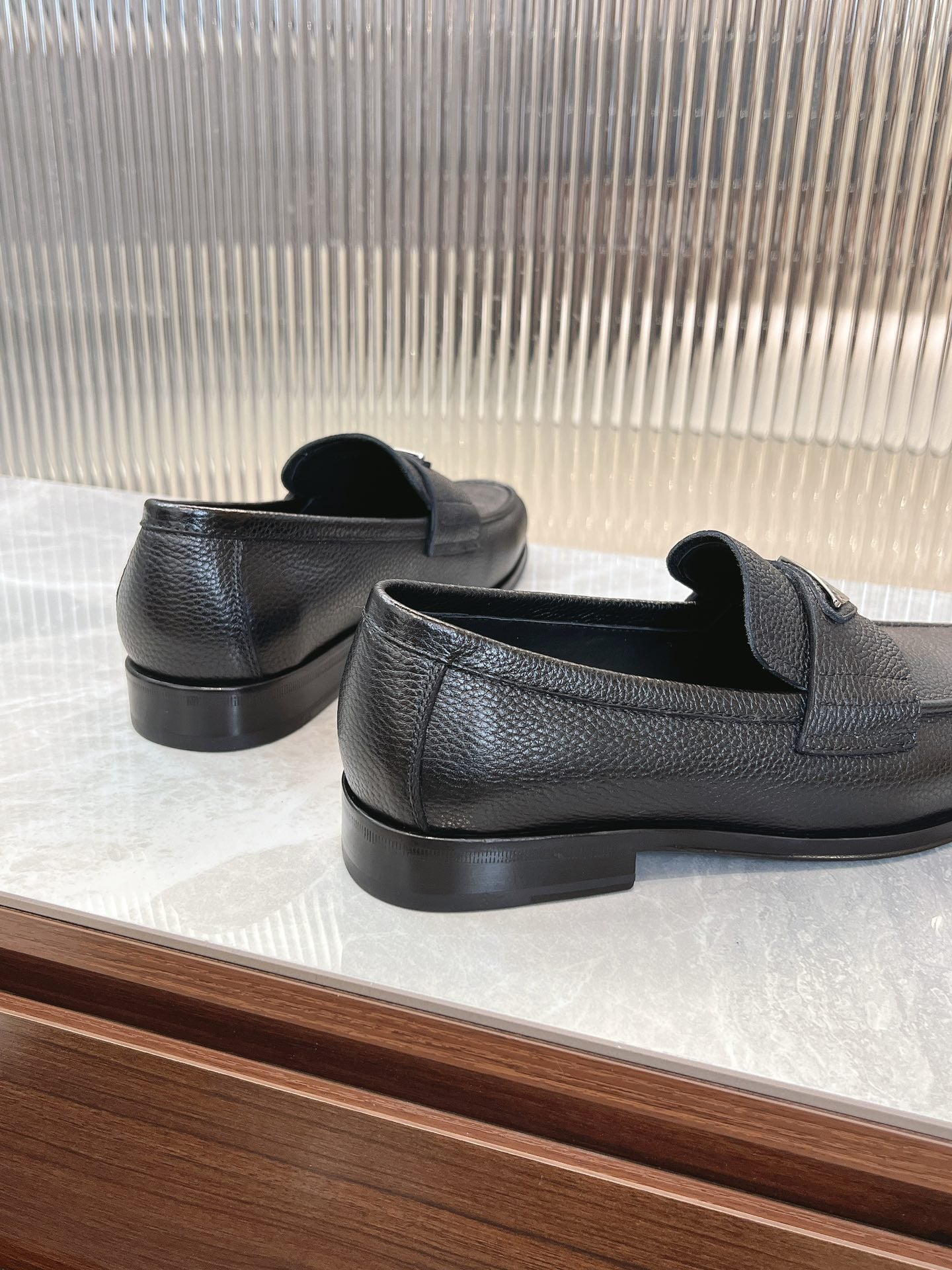 Prada unisex loafers, dark leather with heel and back slip-on collar detail
