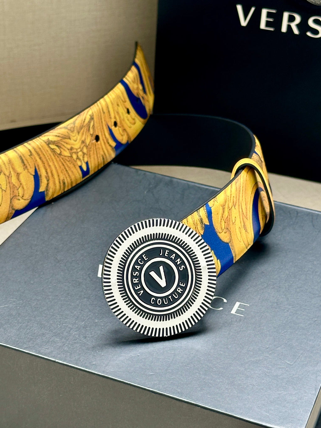 Belt with gold-and-blue baroque print and close-up round Versace logo buckle.