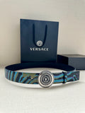 Versace belt with teal-blue patterned strap and round silver logo buckle