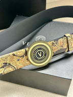 Versace belt close-up: gold baroque strap and round V logo buckle on dark leather