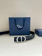 Dior belt with dark monogram strap and black CD buckle, with Dior shopping bag