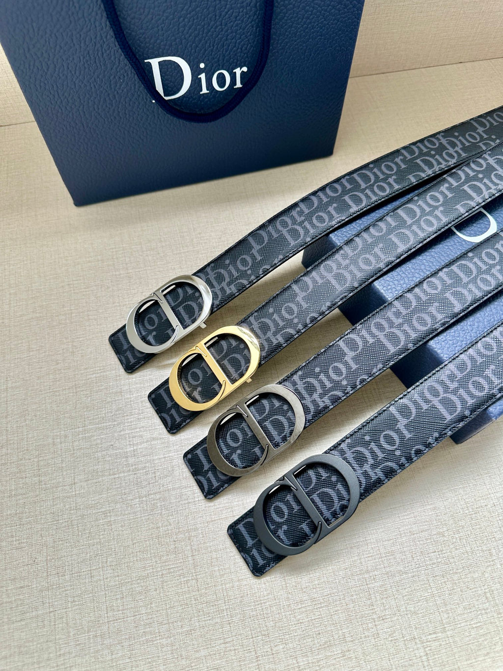 Dior belt set of three with repeating Dior monogram straps and round buckles
