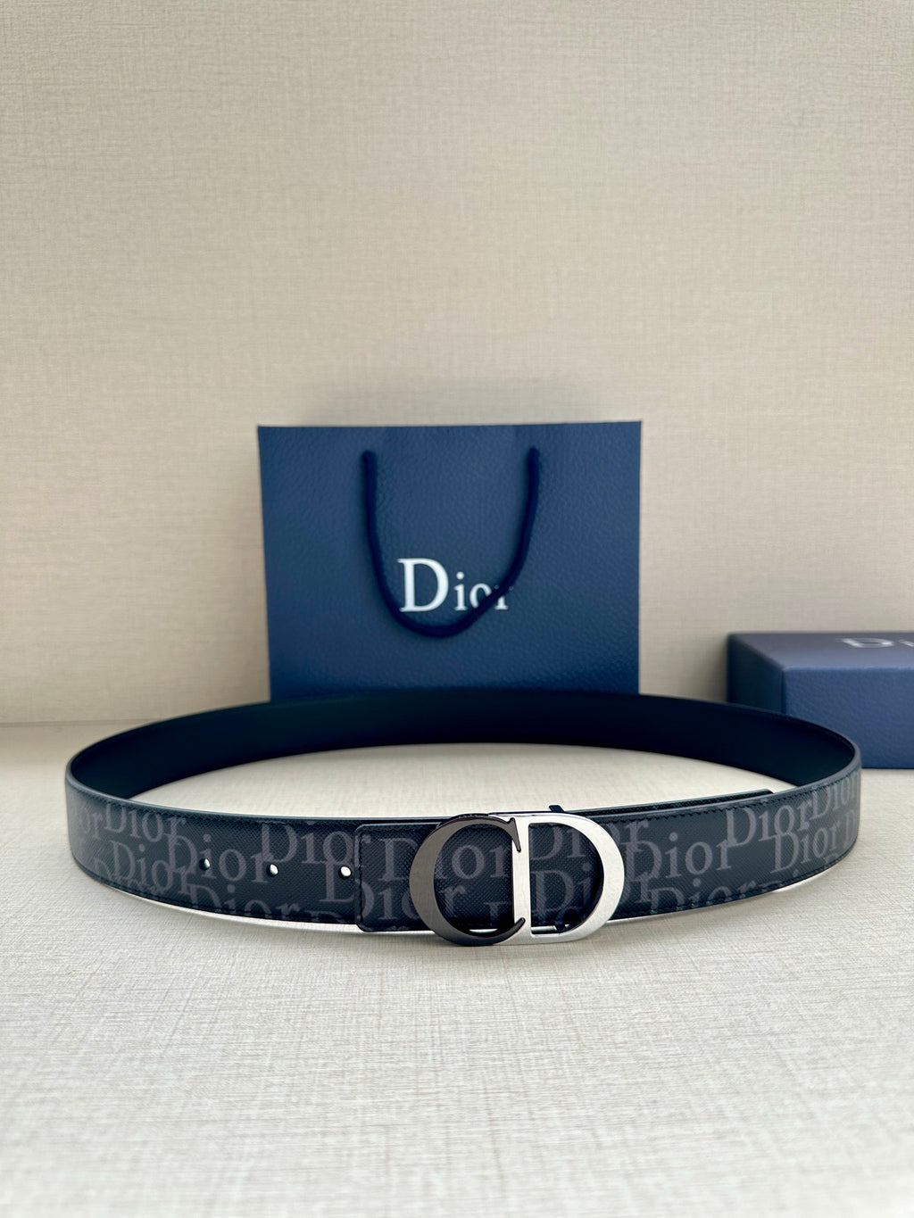 Dior Oblique belt with silver CD buckle and dark blue patterned strap