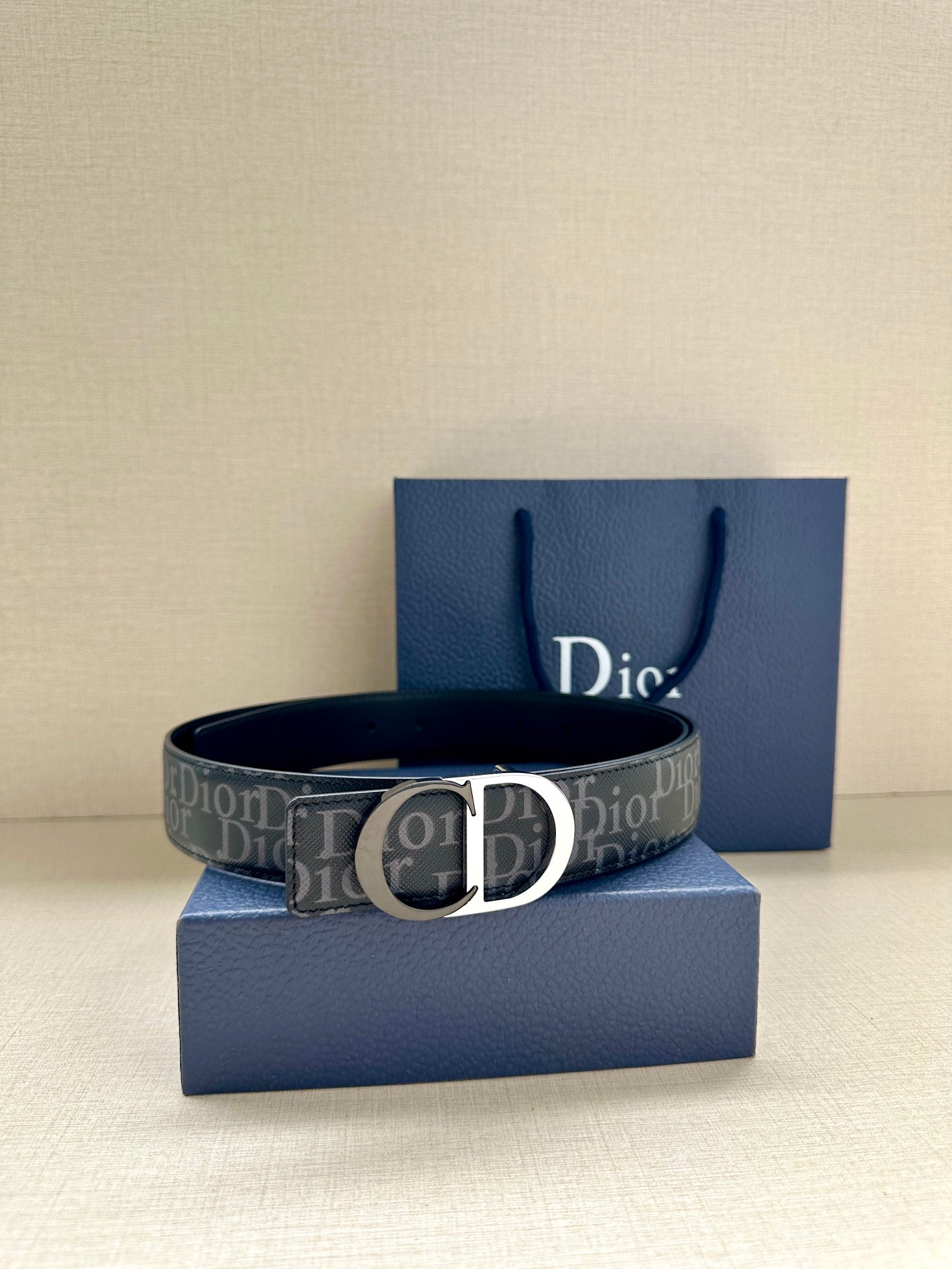 Dior Oblique belt with silver buckle and dark blue patterned strap