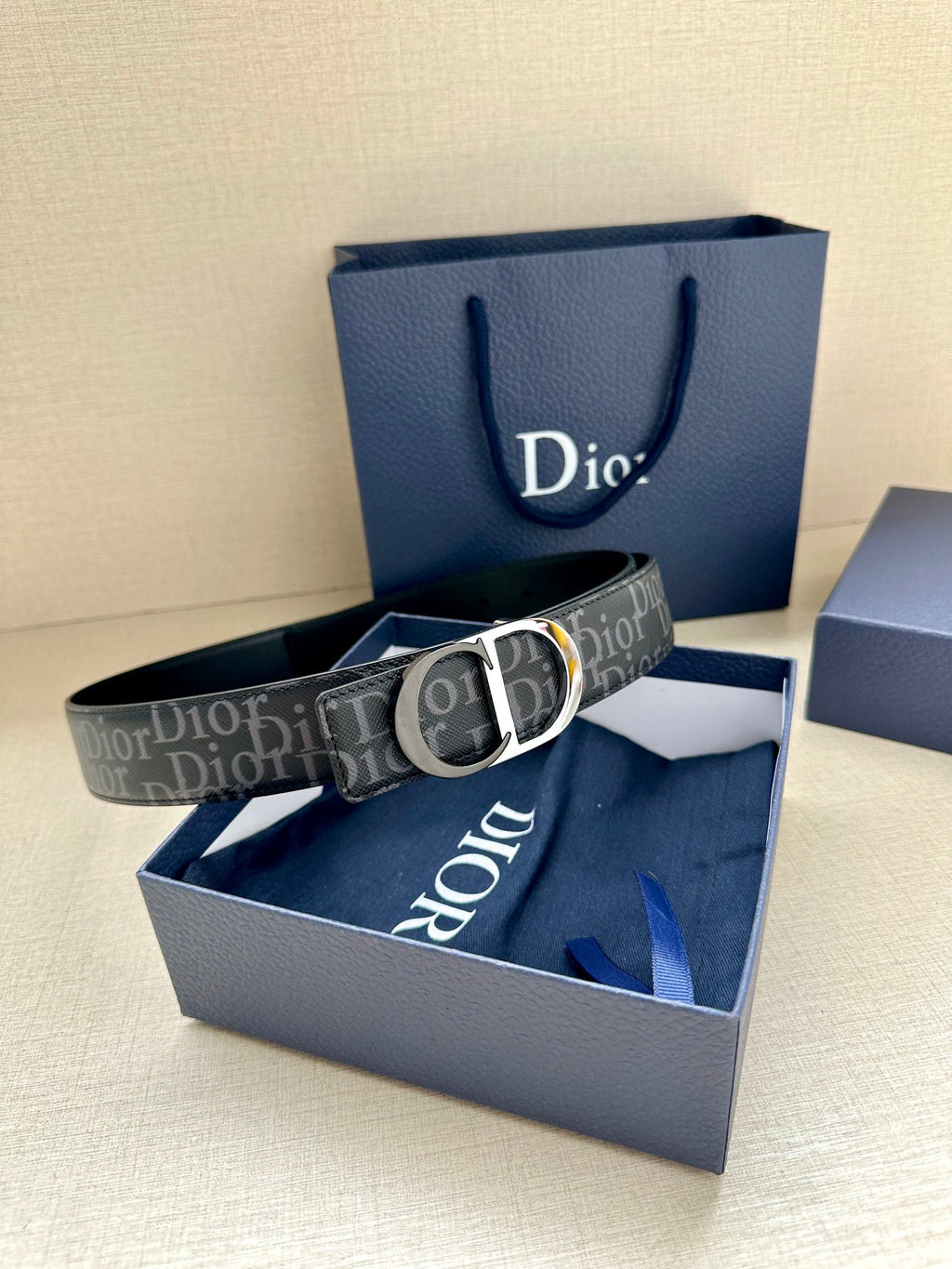 Dior Oblique belt with silver CD buckle and dark blue patterned strap