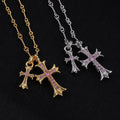 Gold cross pendant necklace with purple stone accents and linked chain