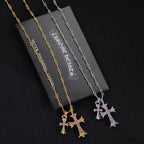 Set of cross pendant necklaces, gold and silver chains with purple stone accents