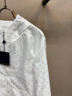 Louis Vuitton white monogram hooded zip jacket close-up on sleeve and shoulder