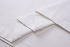 White T-shirt with stitched shoulder seam and folded fabric detail