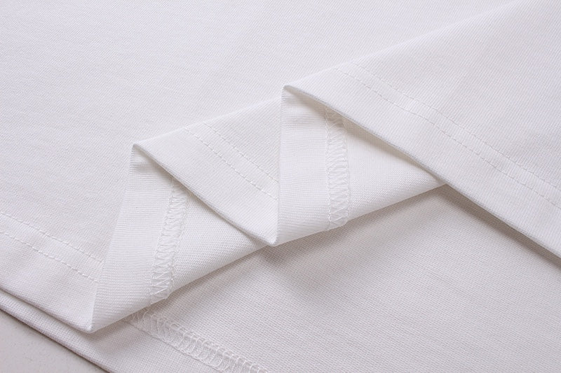 White T-shirt with stitched shoulder seam and folded fabric detail