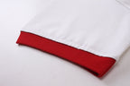 White T-shirt hem with red ribbed underside trim