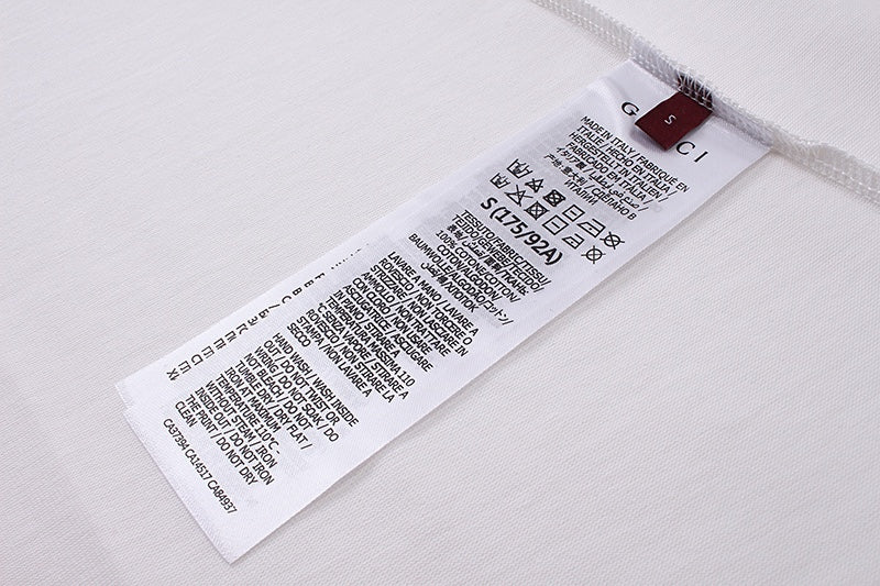 White T-shirt with printed care and size label tag