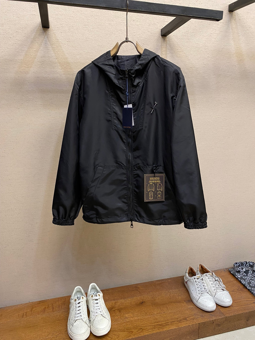 Black hooded Louis Vuitton jacket, full-zip with logo charm and drawstring hem