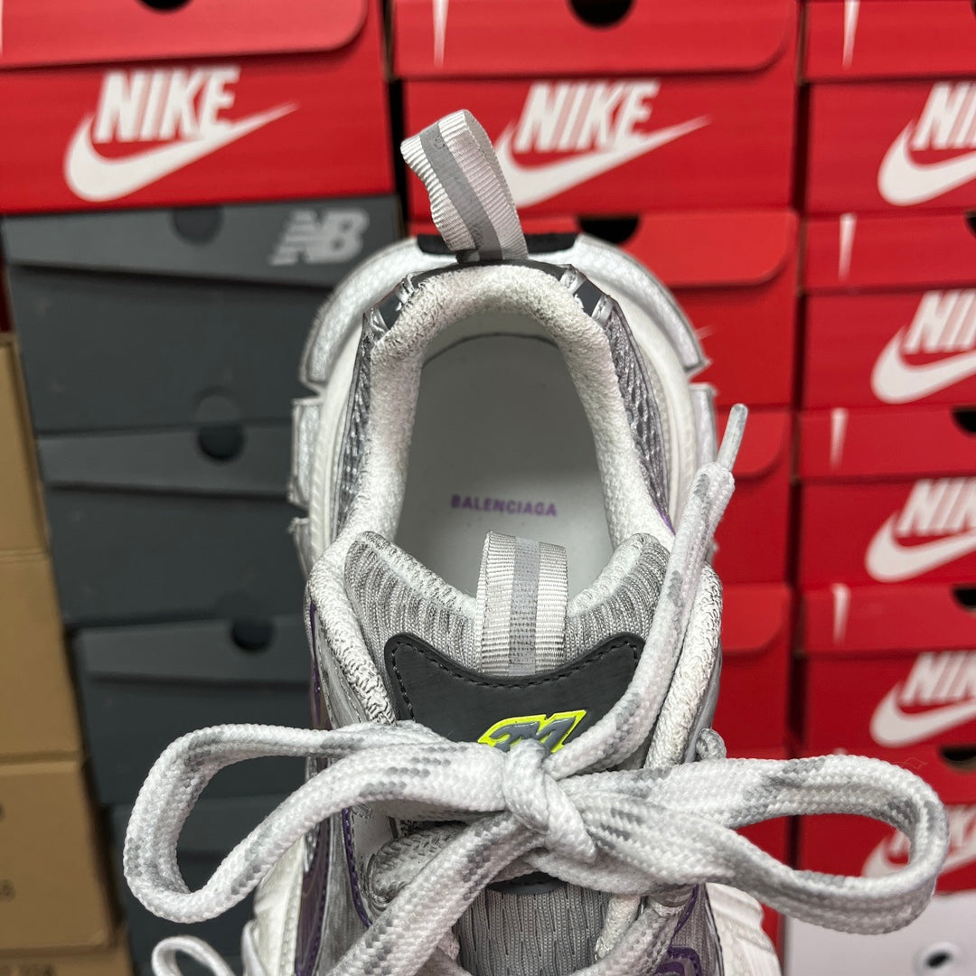 Unisex sneakers, inside heel lining showing Balenciaga branding and woven collar
